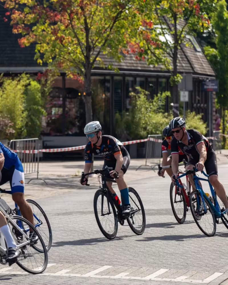 Riders in a group on a sunny road during the Atlantic Crossing